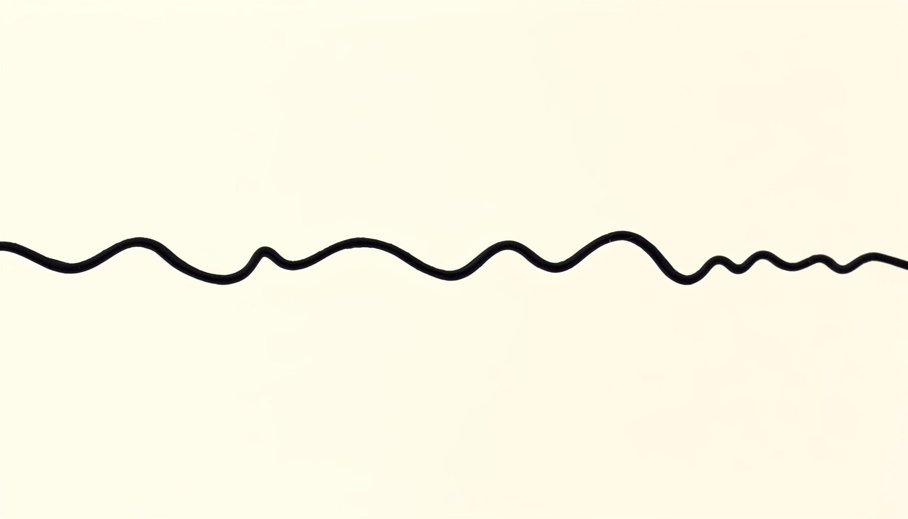 Wavy hand-drawn divider line across a cream background